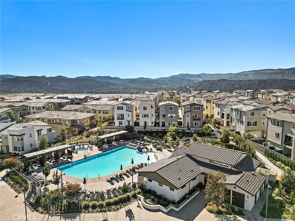 Residential complex with buildings and large swimming pool
