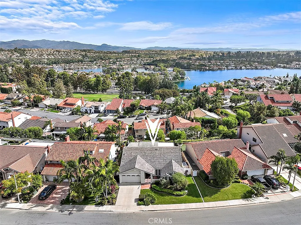 Aerial view of California real estate houses with red roofs and lawns