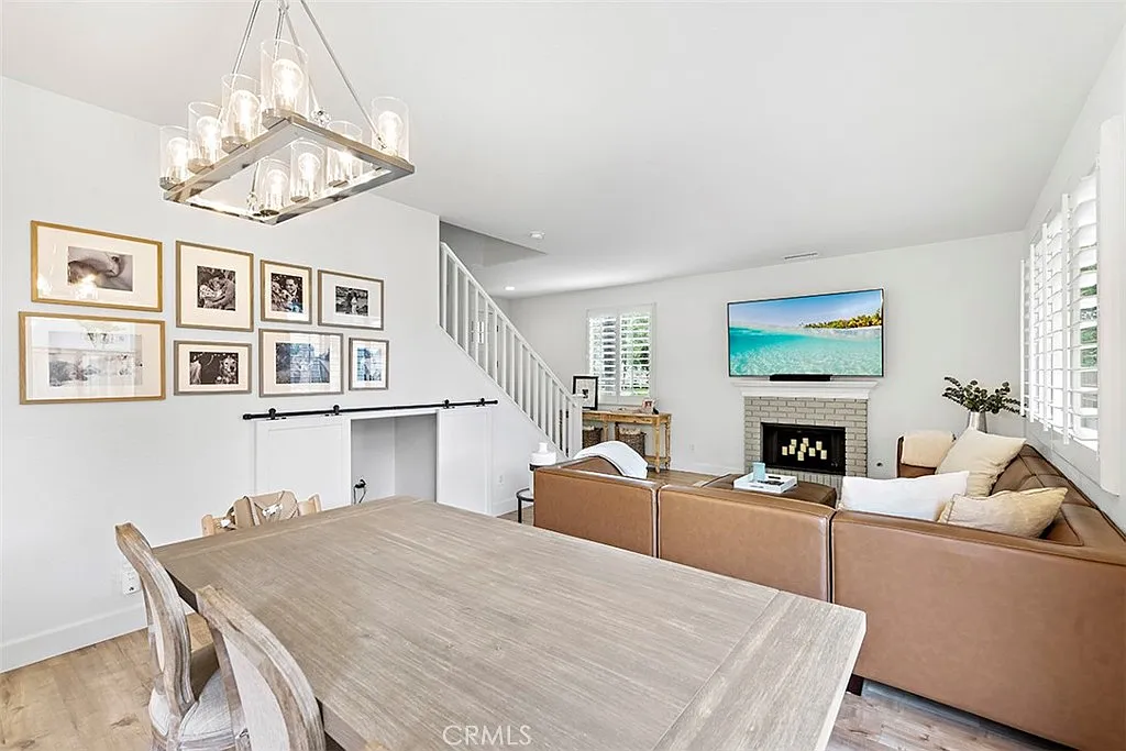 Living room with sofa dining table and TV