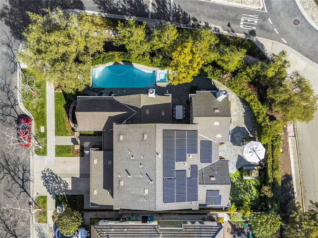 Luxury California real estate house with solar panels trees and pool